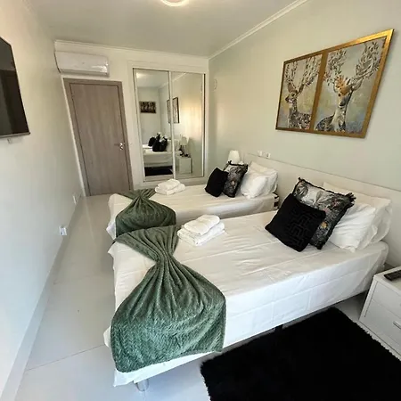 Amazon And Gray Bedrooms Homestay