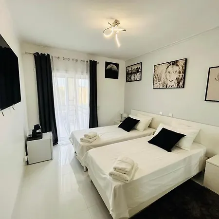 Amazon And Gray Bedrooms Homestay